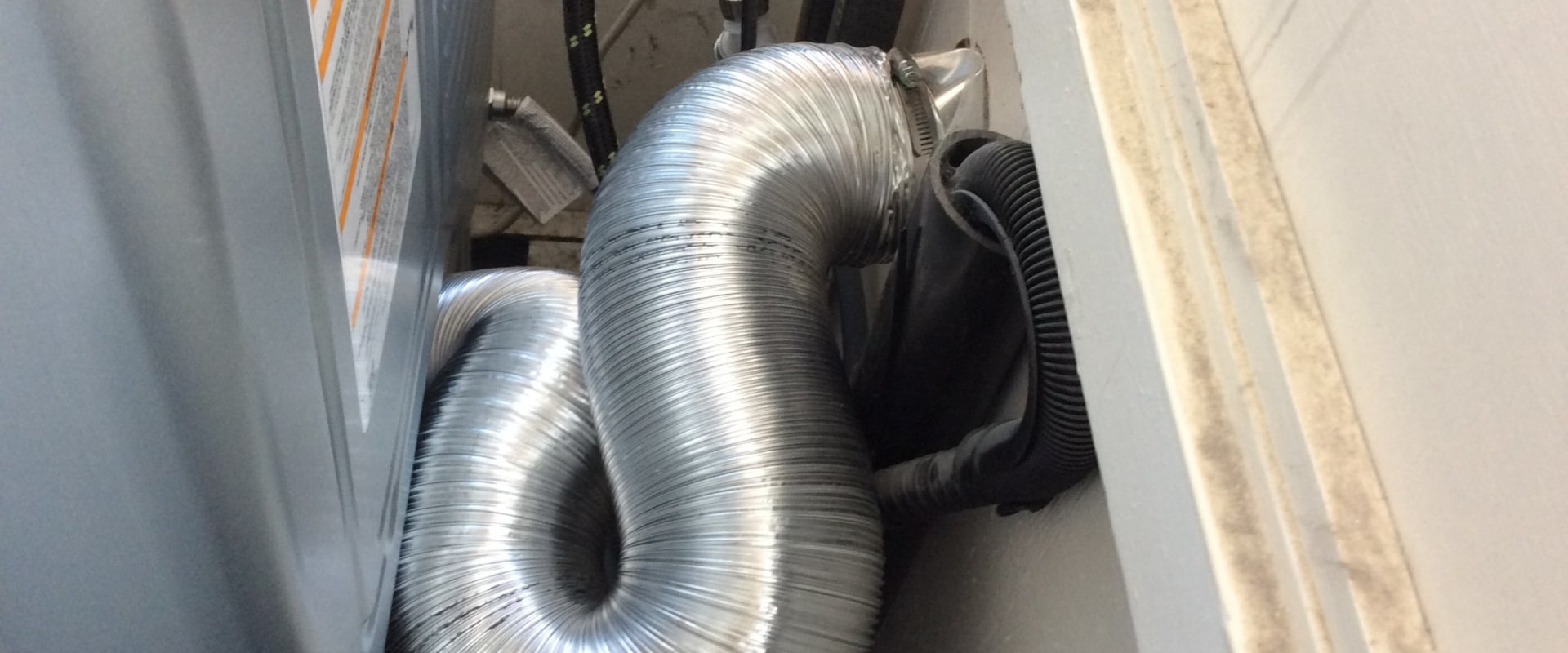 Should a dryer vent hose be straight?